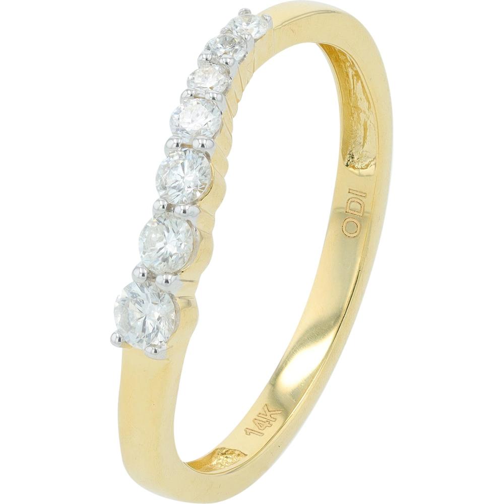 14K yellow gold curved band with prong-set round diamonds sparkling in light