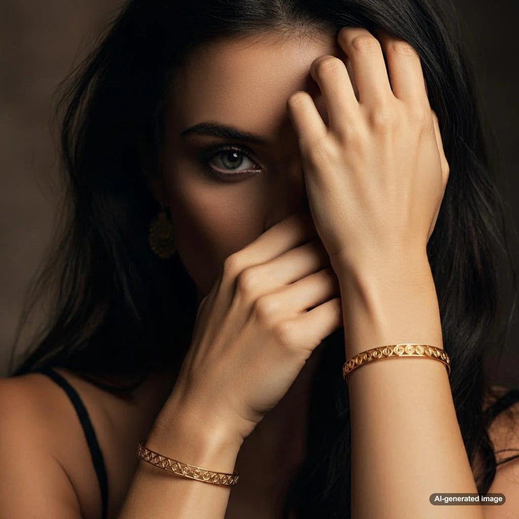 Stylish woman wearing bracelets on both wrists with Robinson's Jewelers accessories