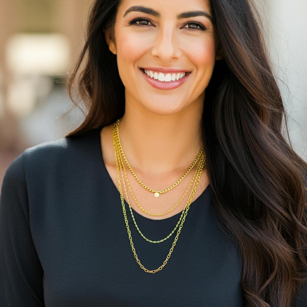 Elegant gold chain necklace displayed on a velvet background