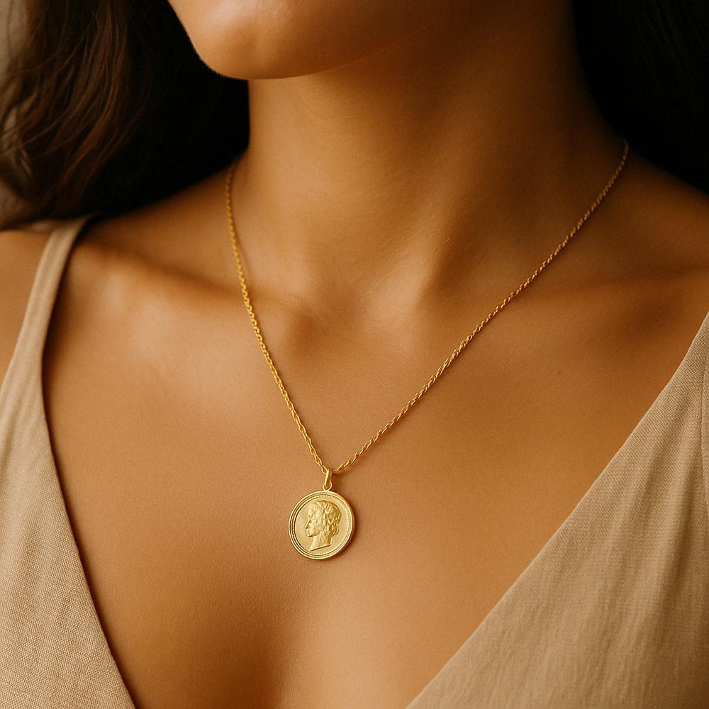A stunning gold coin necklace with intricate detailing, showcasing the timeless elegance of coin necklaces in 2025.