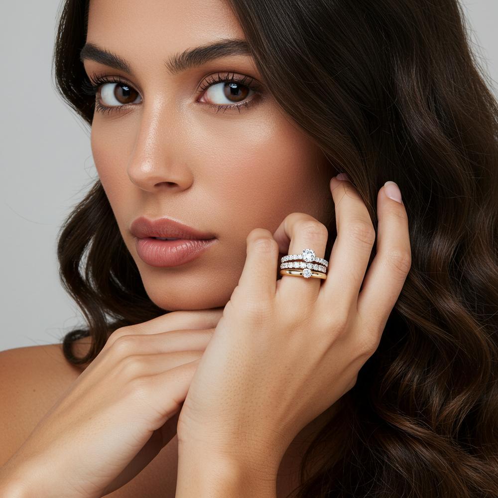 Platinum and gold rings stacked together elegantly