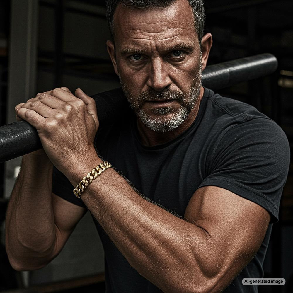 A rugged yet stylish man wearing a bold Cuban link bracelet from Robinson's Jewelers