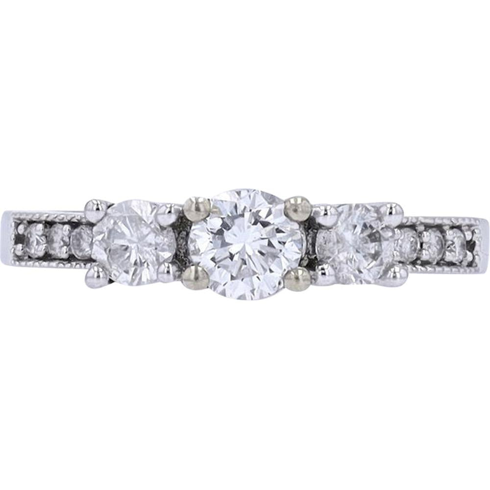 Eternal 14K White Gold Three Stone Diamond Engagement Ring sparkling on a velvet display