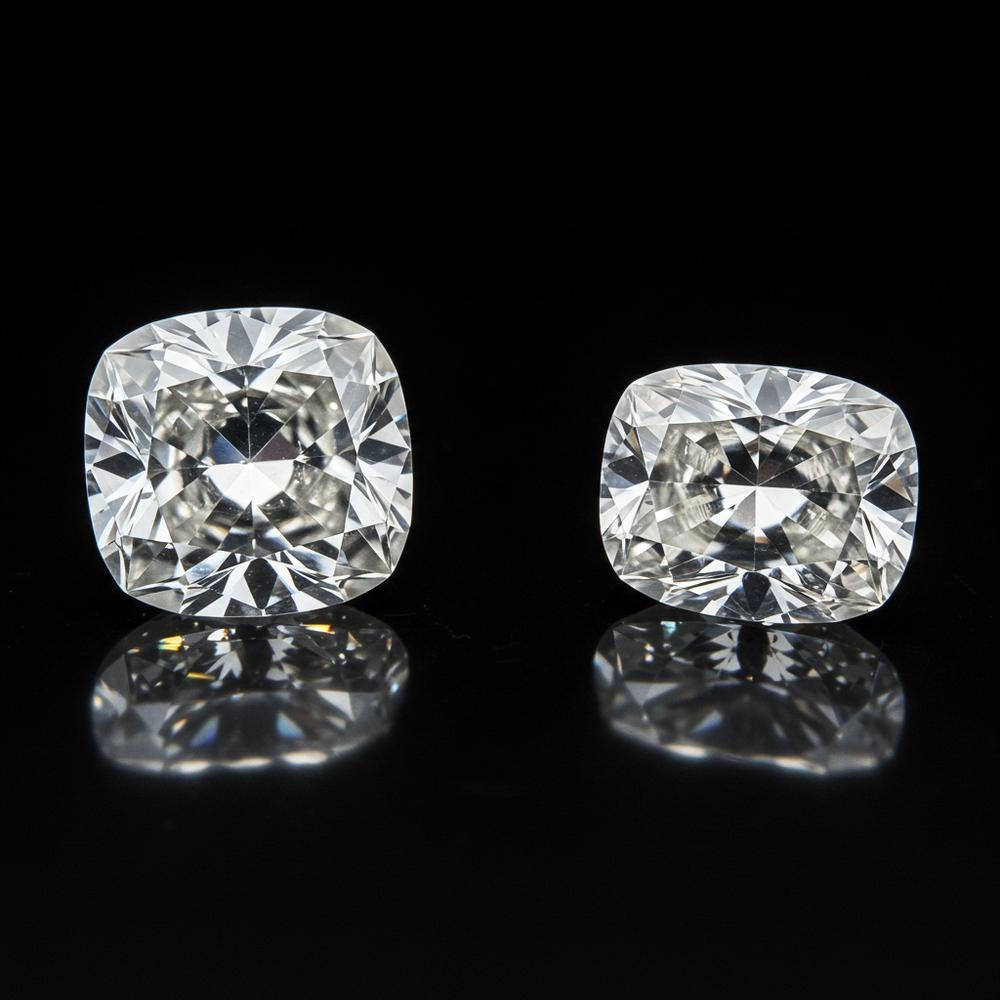 Magnificent cushion cut diamond ring displayed on velvet background