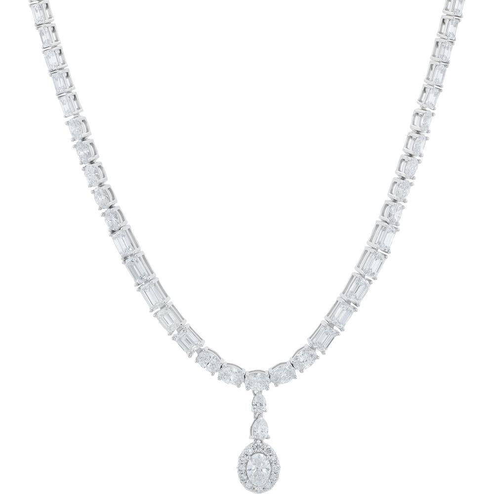 White gold jewelry with rhodium plating, including rings, necklaces, and earrings