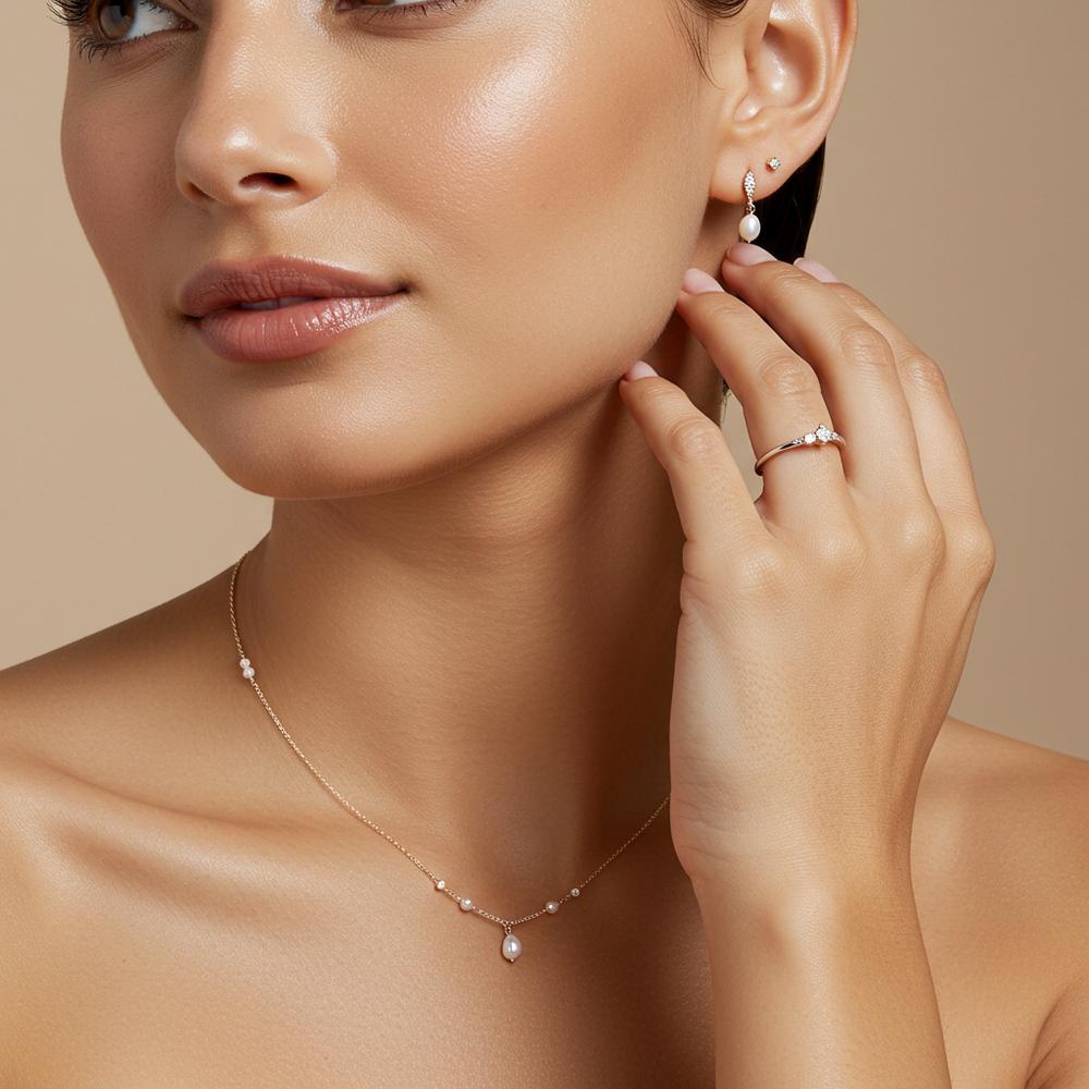 A selection of jewelry pieces displayed on various skin tones, showcasing the best matches for warm, cool, and neutral complexions.