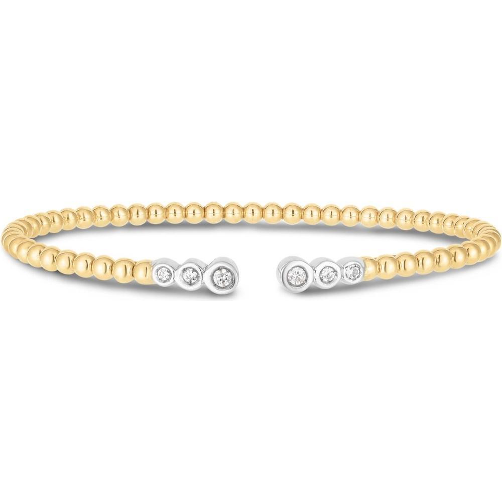 A curated selection of mixed metal jewelry including gold, silver, and rose gold pieces