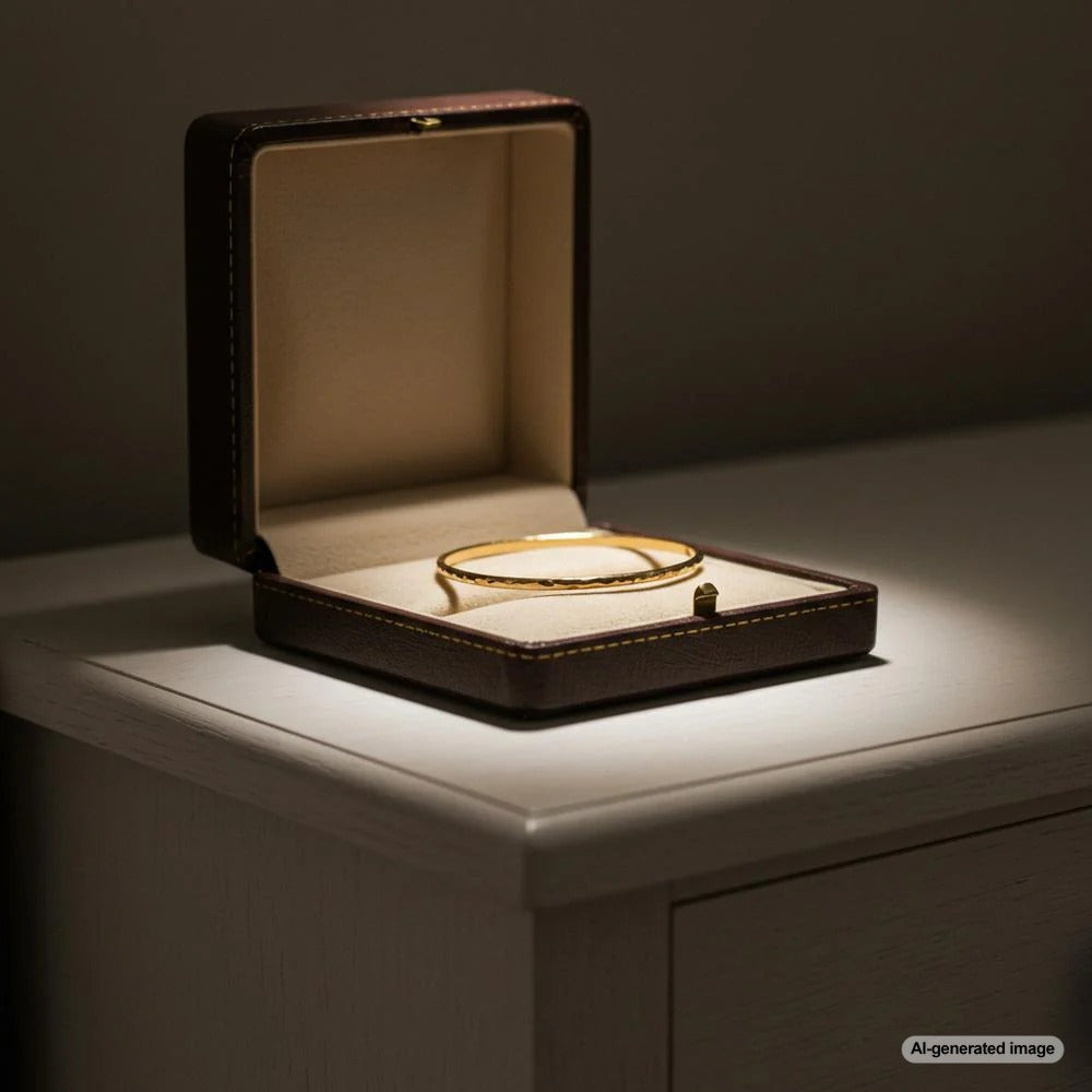 Elegant 10k gold jewelry pieces including rings, necklaces, and bracelets displayed on a velvet tray