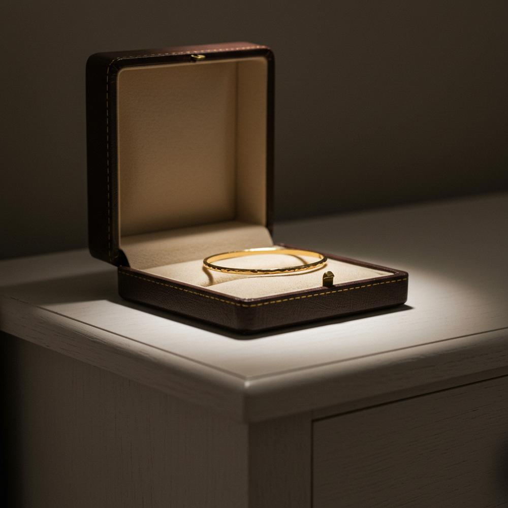 Elegant 10k gold jewelry pieces including rings, necklaces, and bracelets displayed on a velvet tray