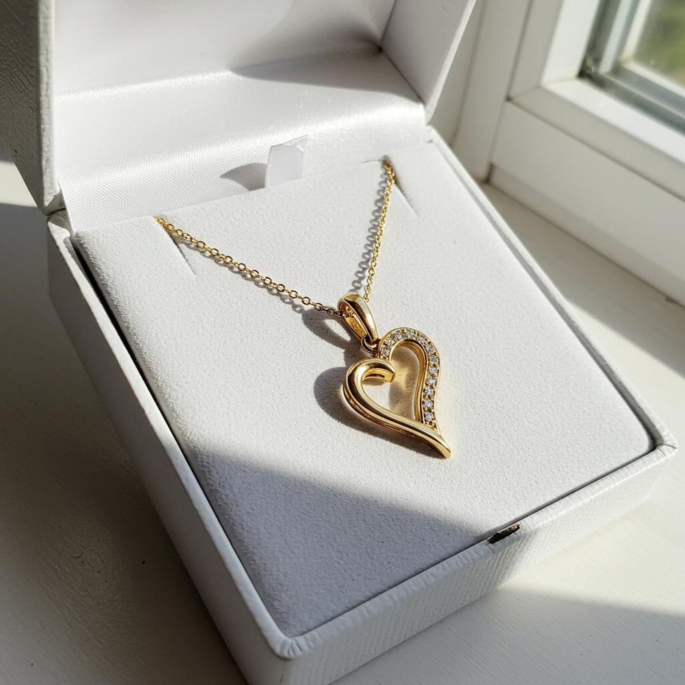 Comparison of 14k and 18k gold jewelry showcasing color and durability differences