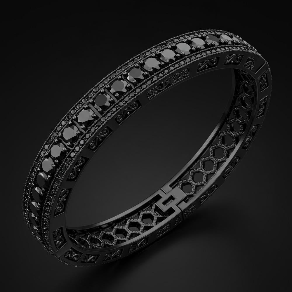 A stylish men's black diamond bracelet set in sterling silver, exuding sophistication and modern elegance.