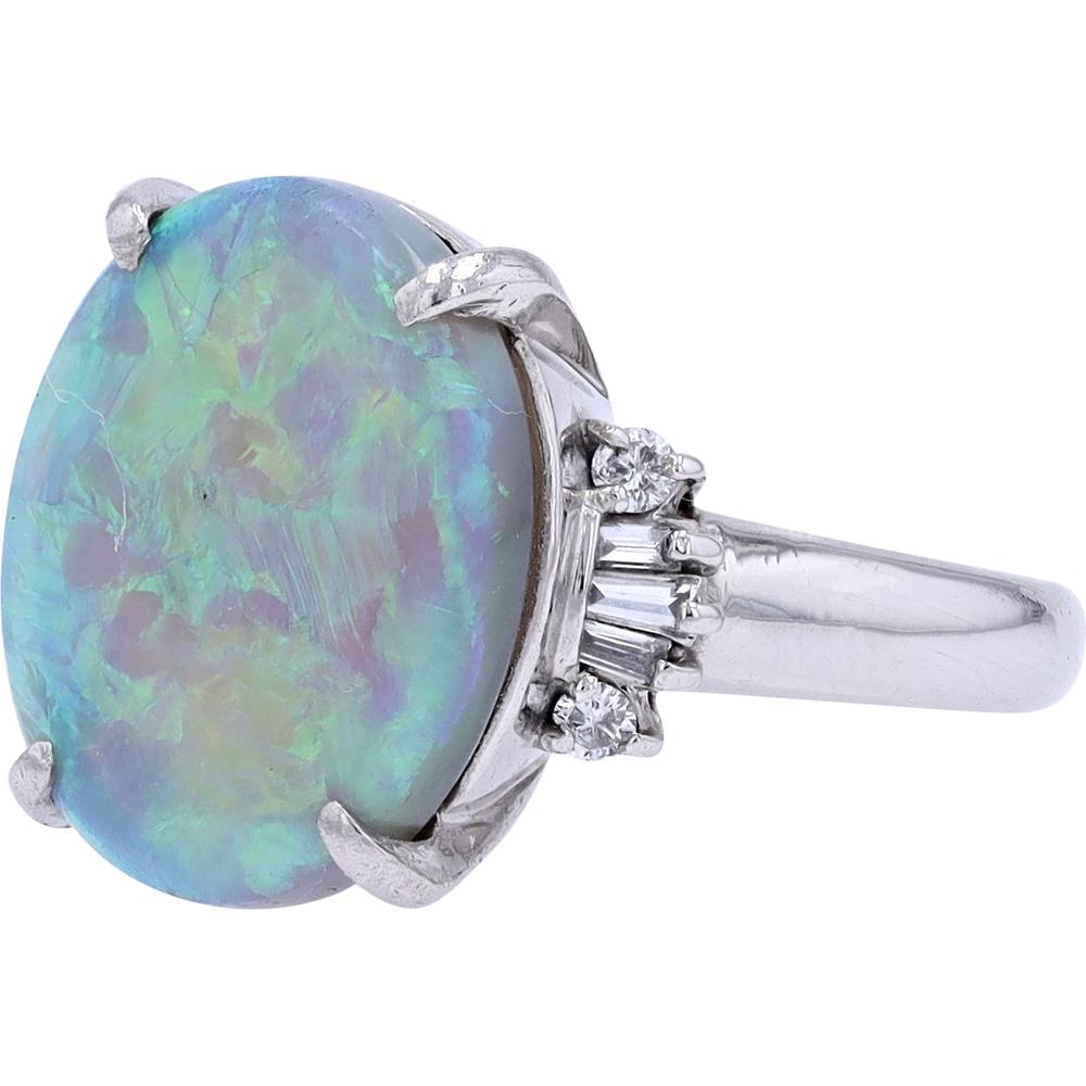 Stunning Platinum 4.67 Carat Oval Opal Ring with Diamond Accents