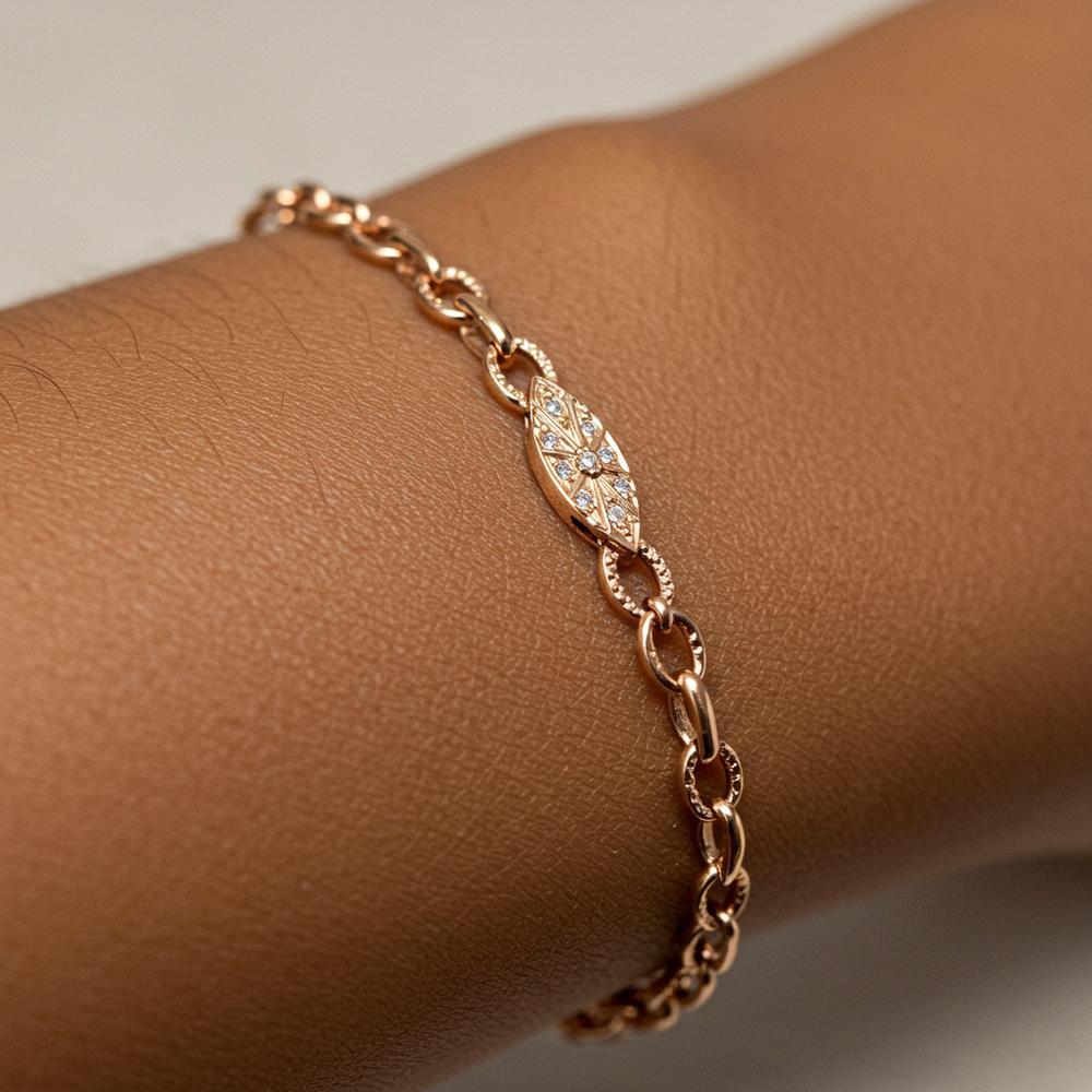 Elegant rose gold jewelry including rings, necklaces, and bracelets showcasing the metal's warm pink hue