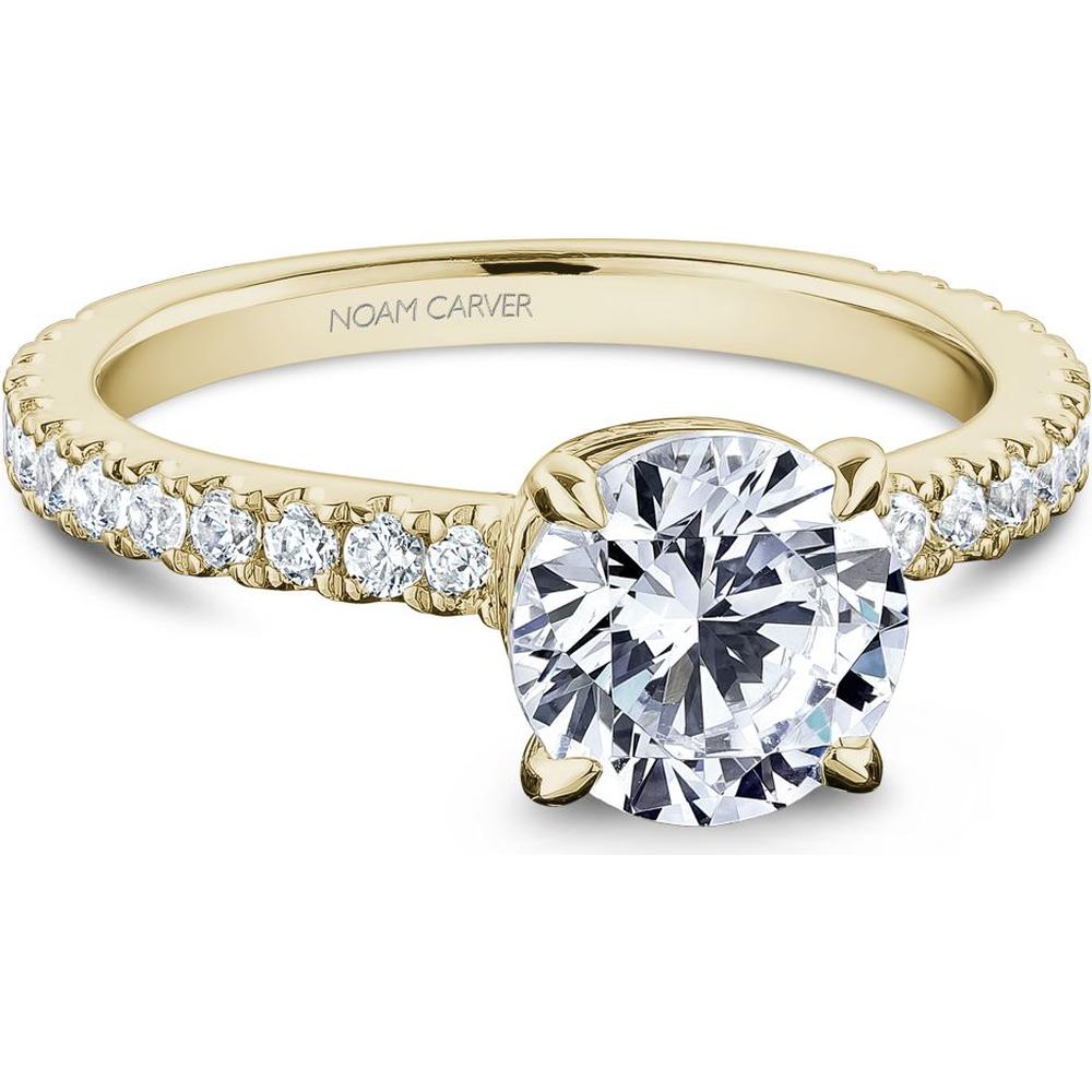 Yellow gold diamond engagement ring with pav� set band from Robinson's Jewelers