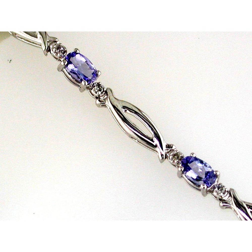 Royal 14K White Gold Tanzanite and Diamond Bracelet showcasing rare violet-blue tanzanite surrounded by sparkling diamonds