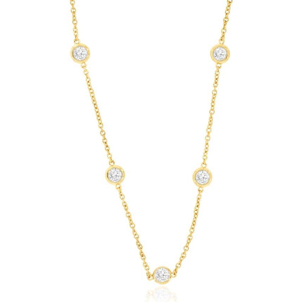 Gold Station Necklace by Robinson's Jewelers featuring bezel-set round diamonds on a 14K yellow gold chain