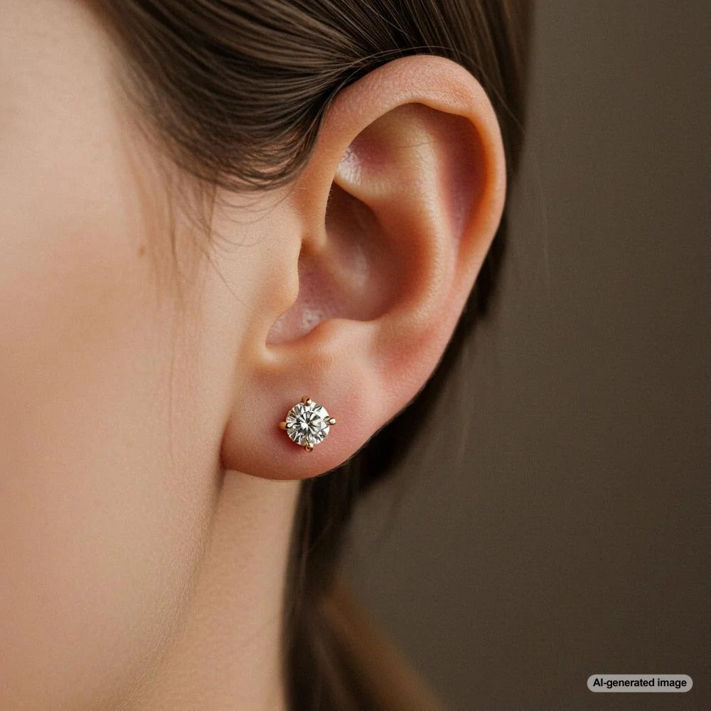 Woman sleeping with earrings on a nightstand
