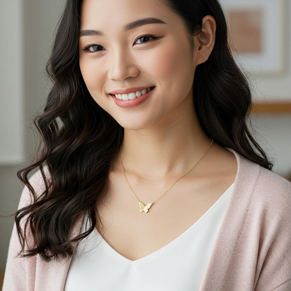 Elegant gold butterfly necklace with intricate detailing, perfect for any occasion.