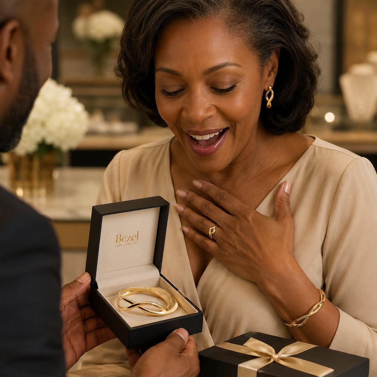 Sculptural design jewelry collection featuring bold gold rings and architectural bracelets at Robinson's Jewelers