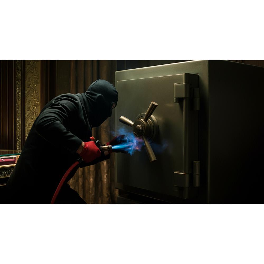 A collage depicting infamous jewelry heists throughout history