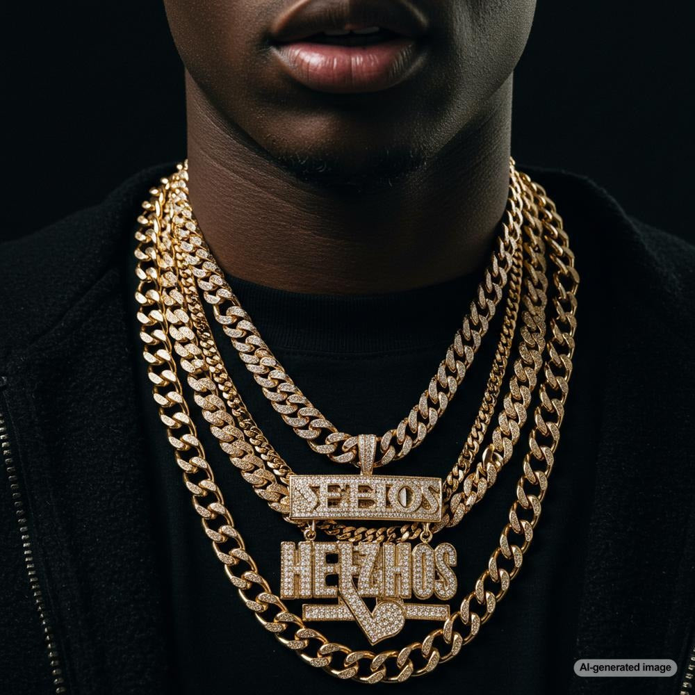 Vintage gold hip-hop chains displayed on black velvet with diamond pendants