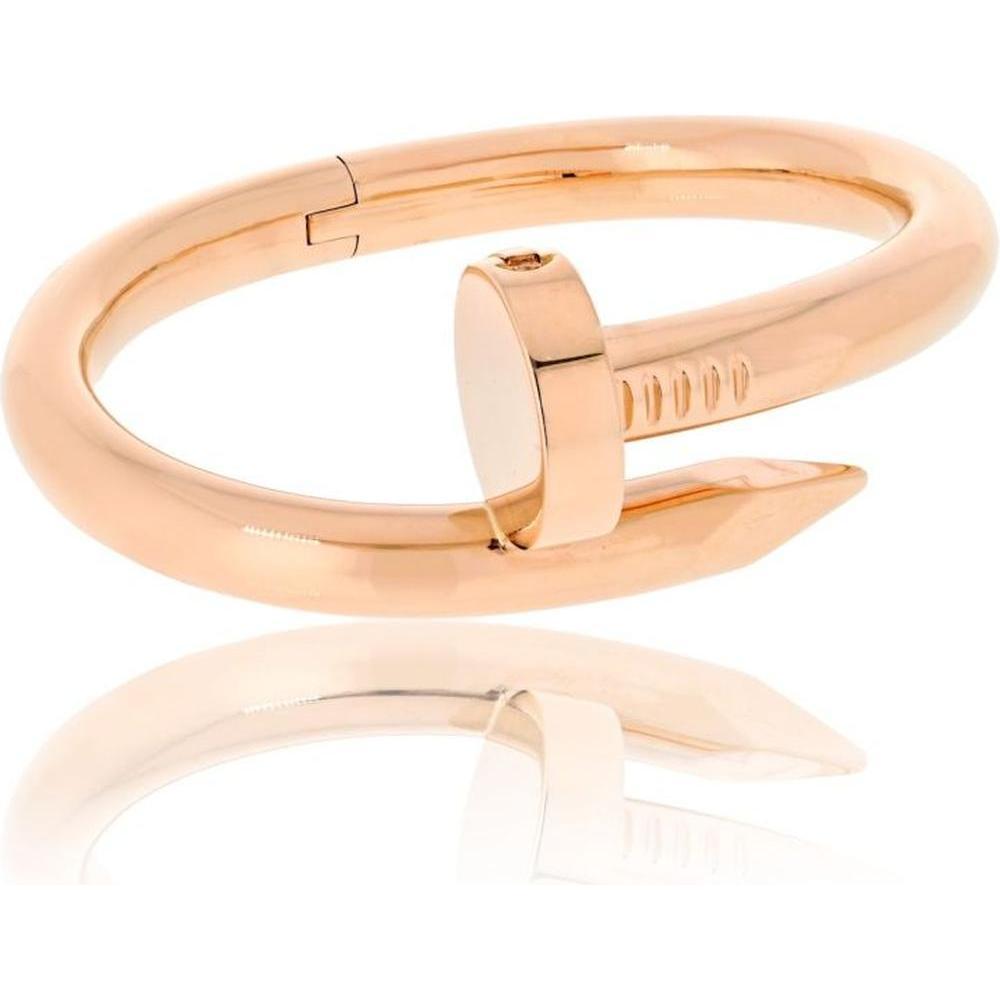 Elegant rose gold jewelry collection featuring rings, bracelets, and necklaces