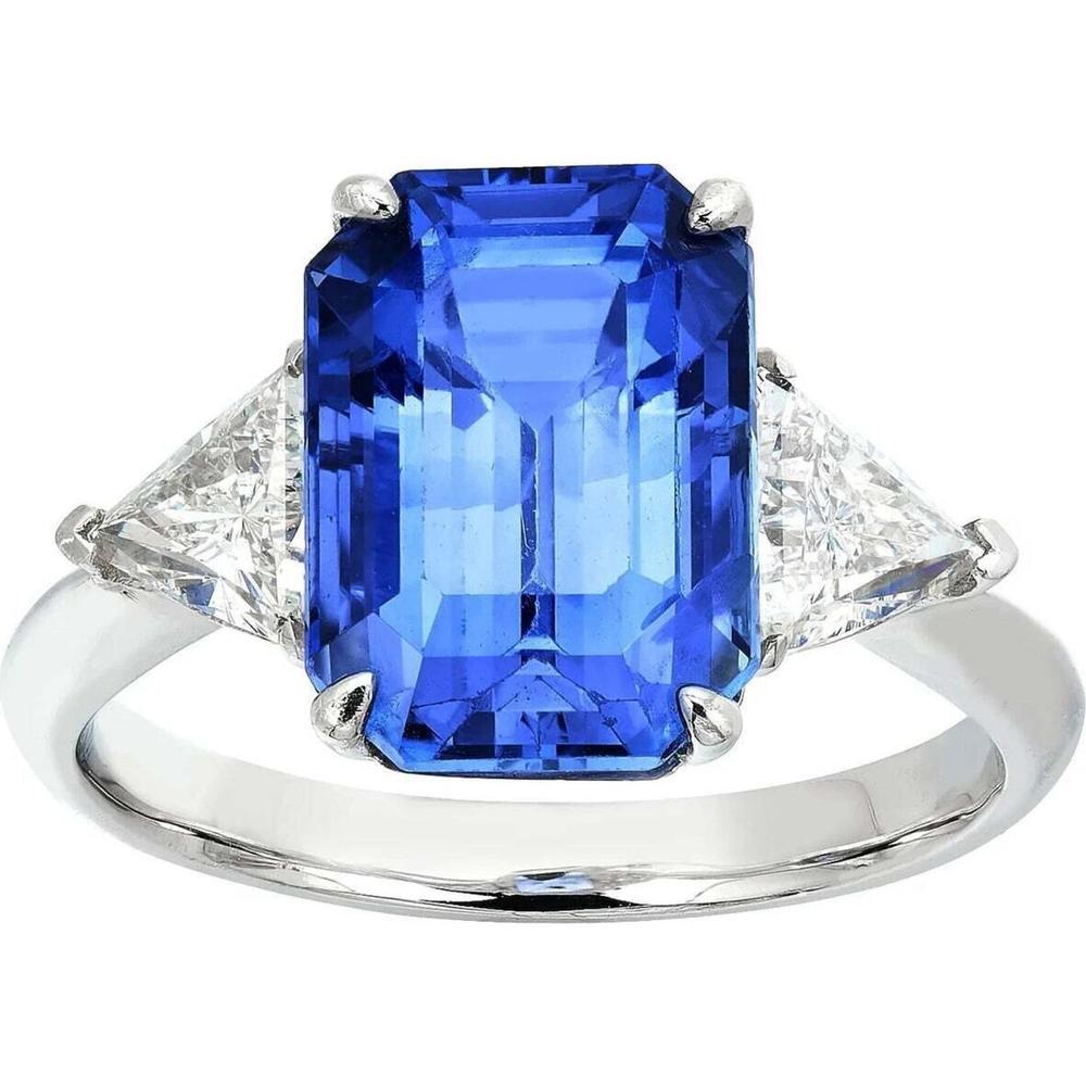 A stunning blue sapphire engagement ring set in white gold with diamond accents