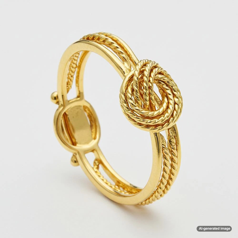 Close-up of elegant gold knot jewelry showcasing intricate intertwined design