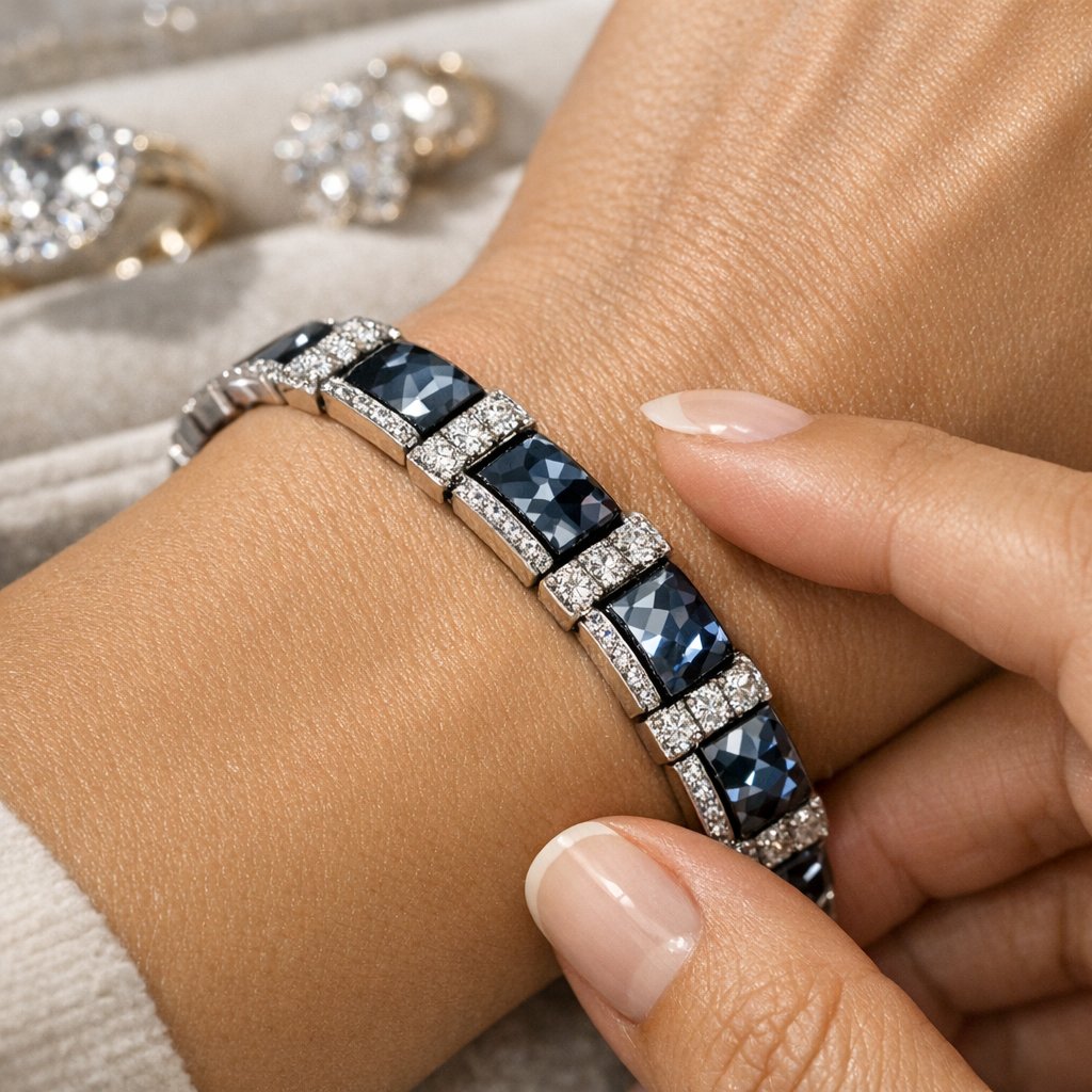 Osmium crystal jewelry featuring brilliant blue sparkle on a luxury watch face