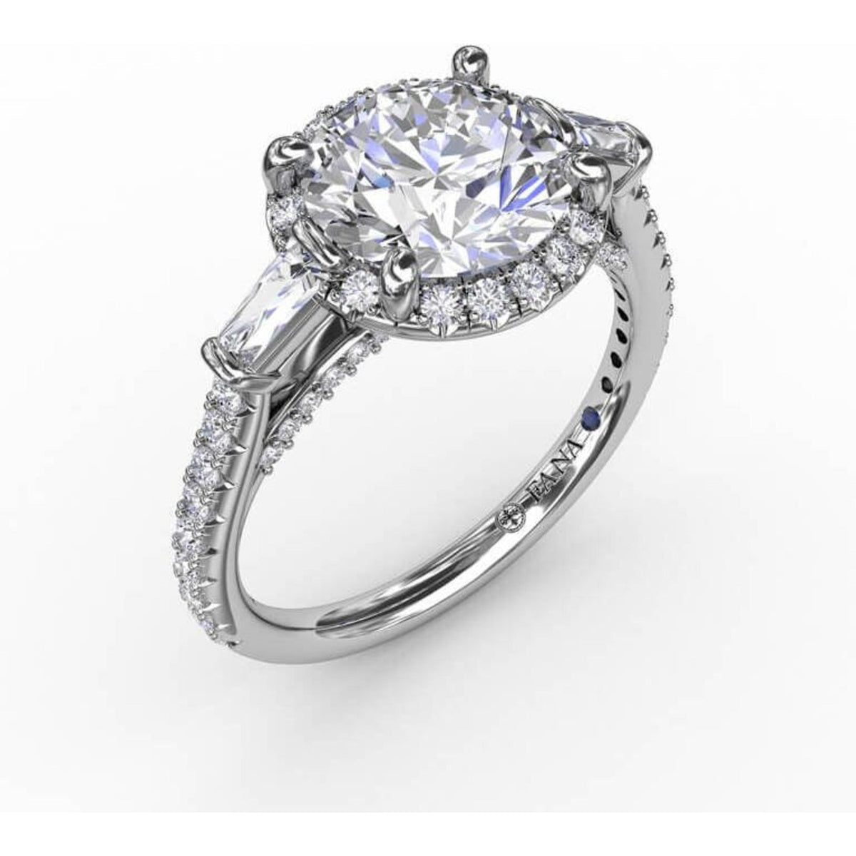 Vintage round diamond halo engagement ring with tapered baguettes