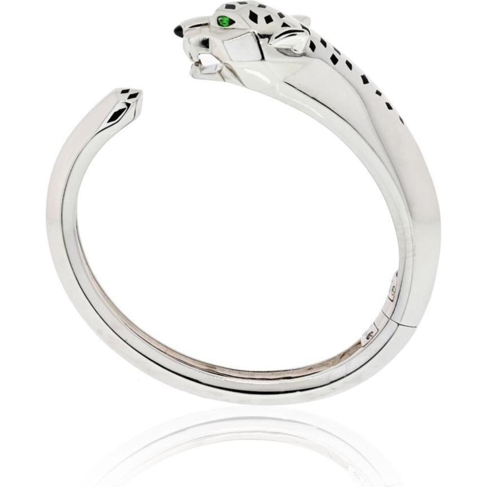 Luxury panther motif jewelry piece featuring black onyx and diamonds