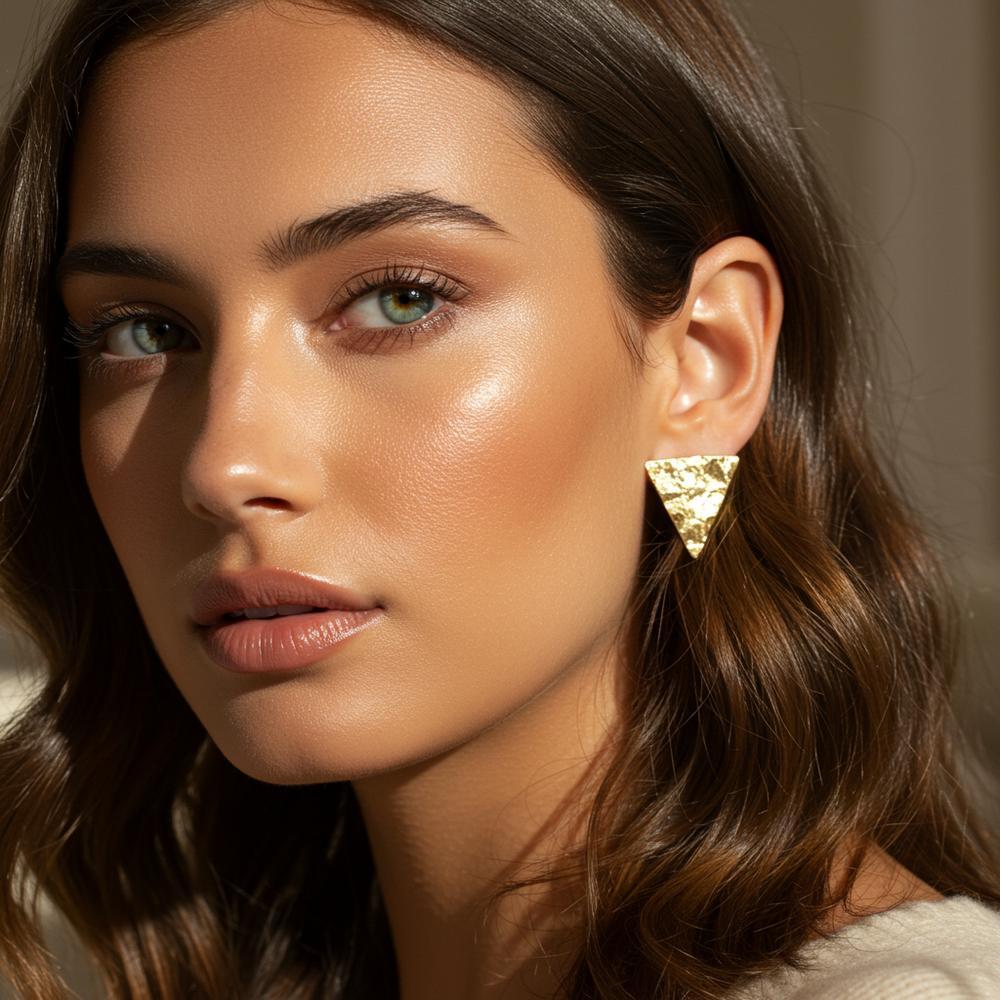 Triangle geometric jewelry symbolizing balance, harmony, and strength