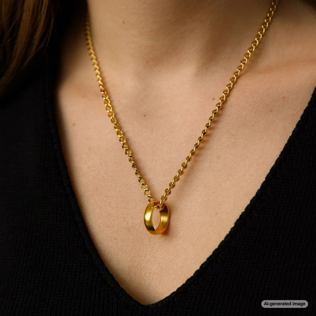 A stunning close-up of a diamond wedding ring hanging from an elegant gold chain, symbolizing love and remembrance