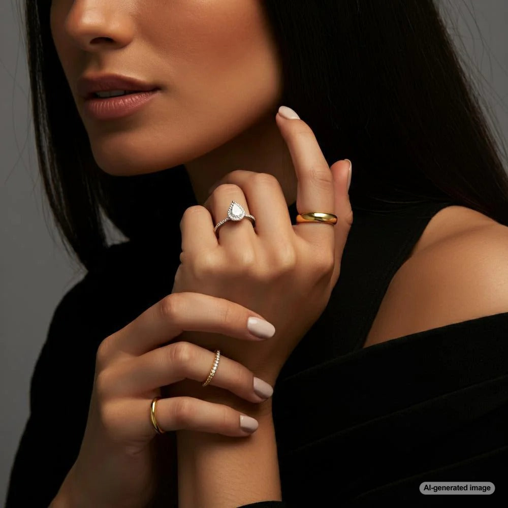 Hand adorned with rings on each finger, symbolizing various meanings