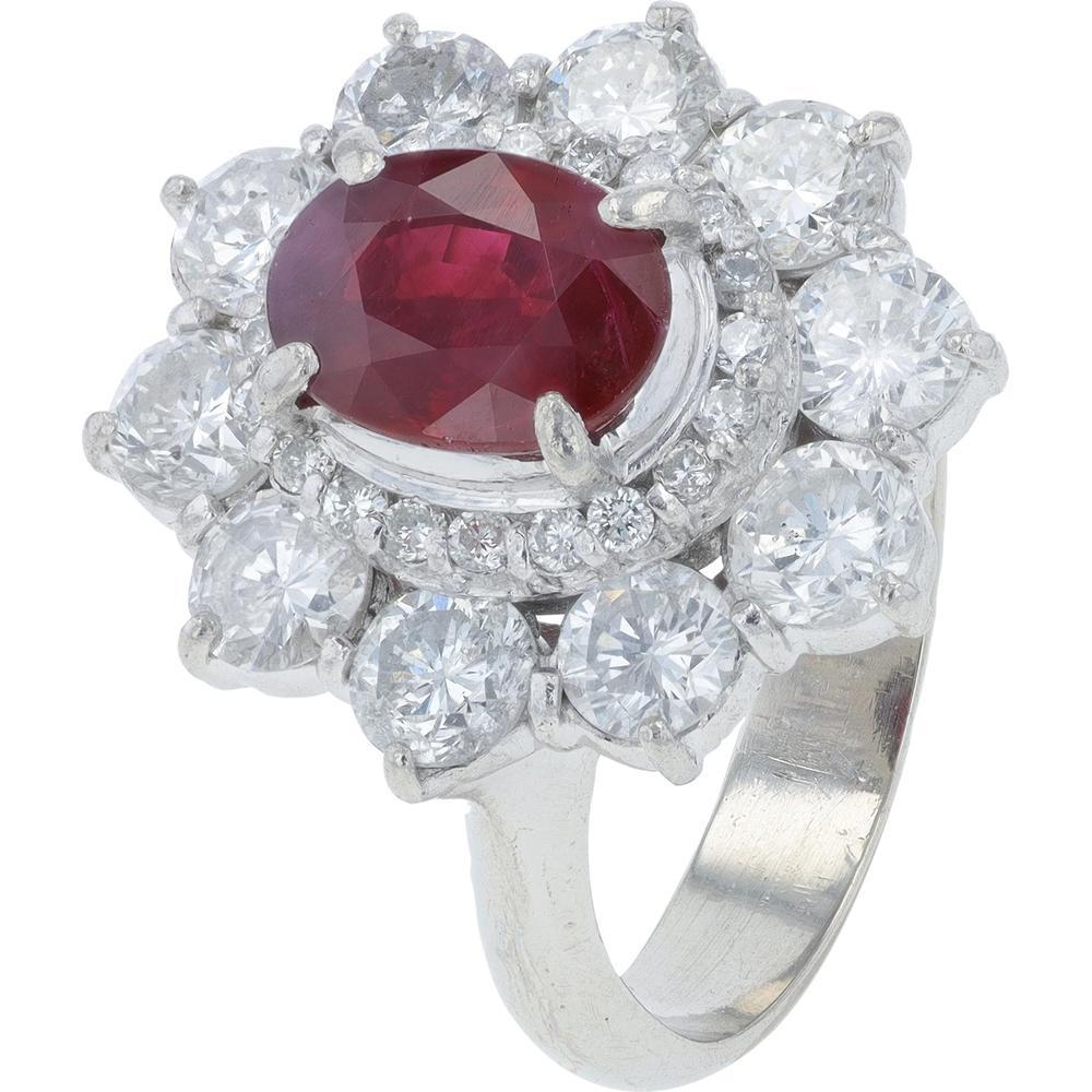 Close-up of a stunning ruby gemstone in a gold setting, showcasing its deep red color and brilliant sparkle