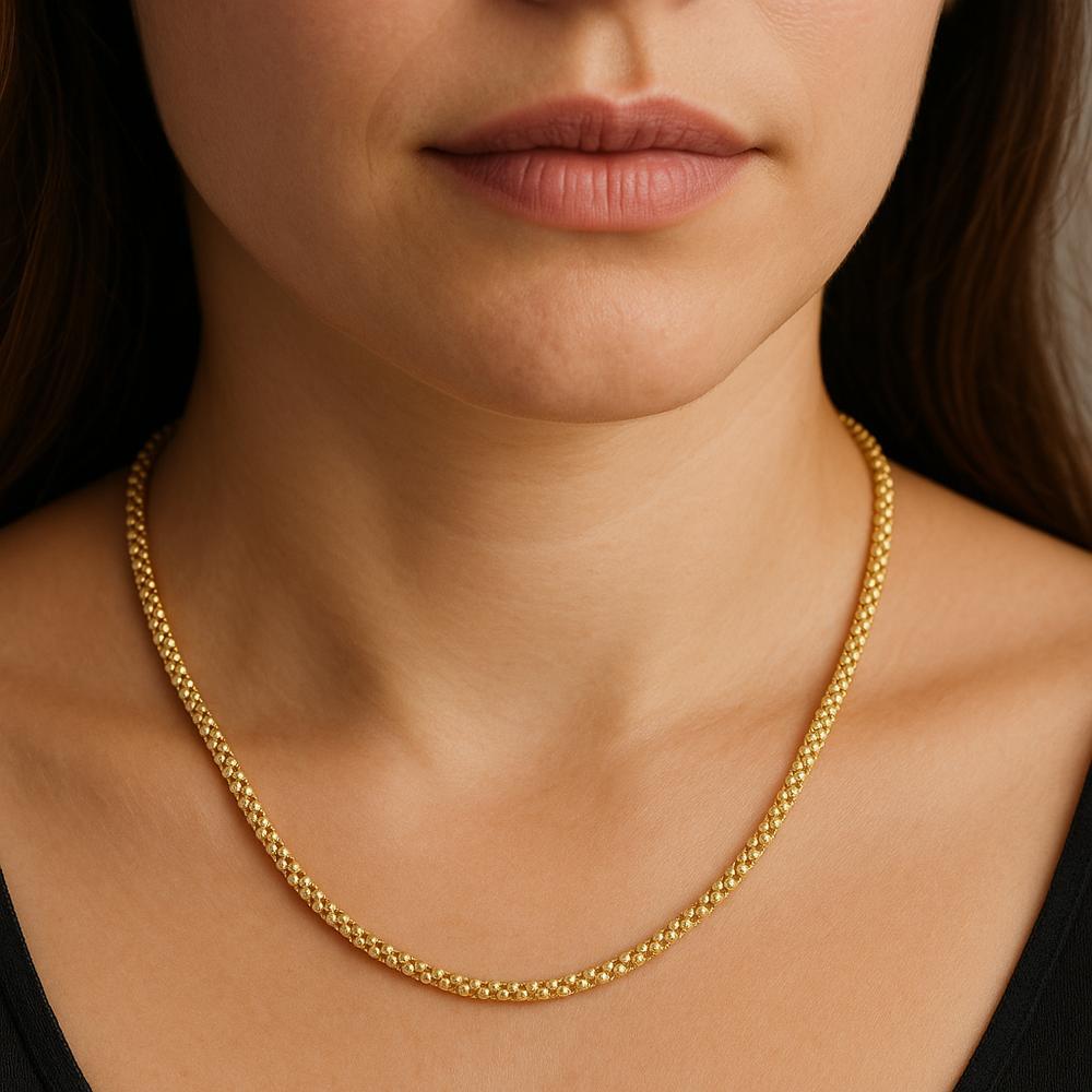 A close-up of a stunning popcorn chain necklace, showcasing its unique textured links and elegant design.