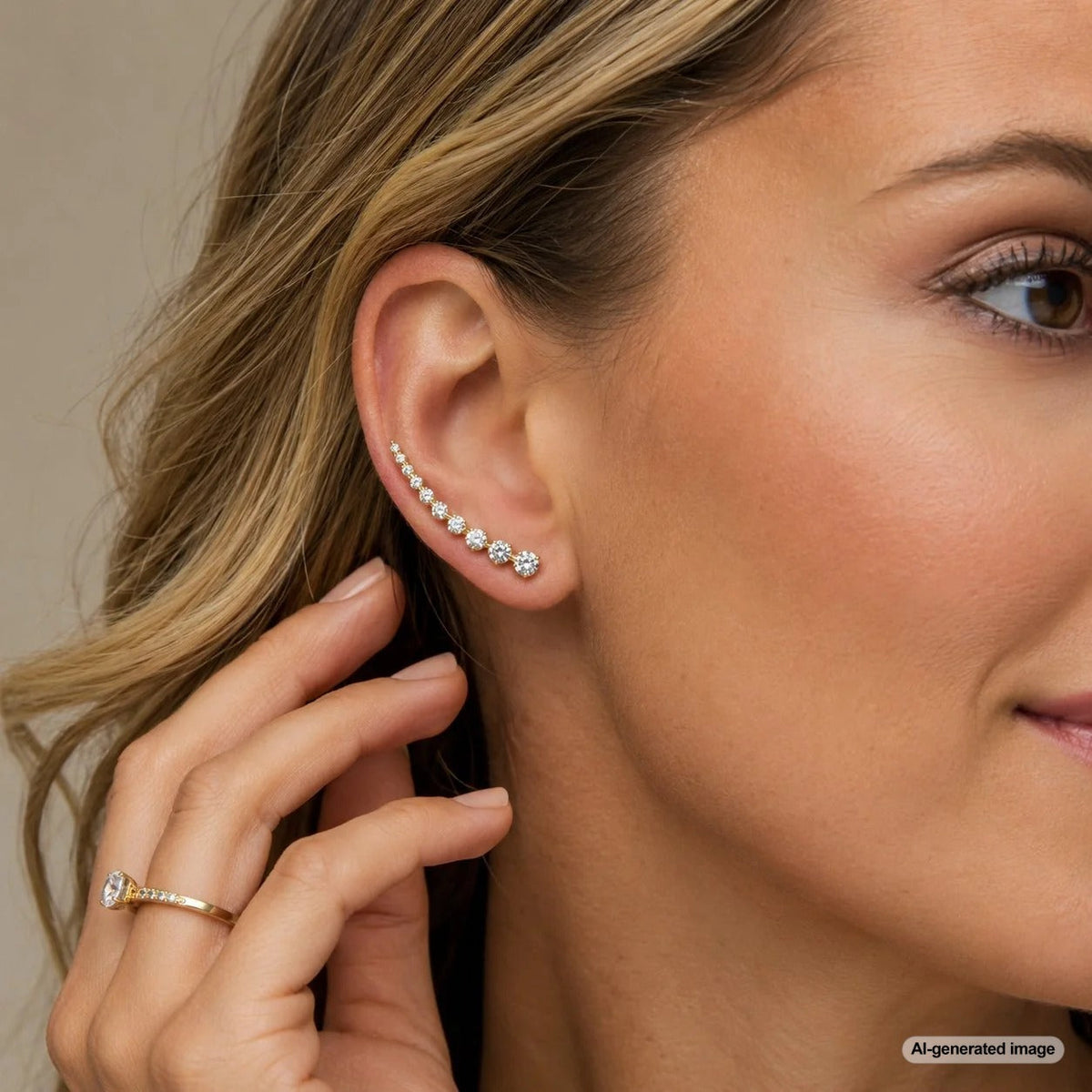 A modern ear climber earring gracefully ascending the ear, showcasing its trendy design and secure fit.