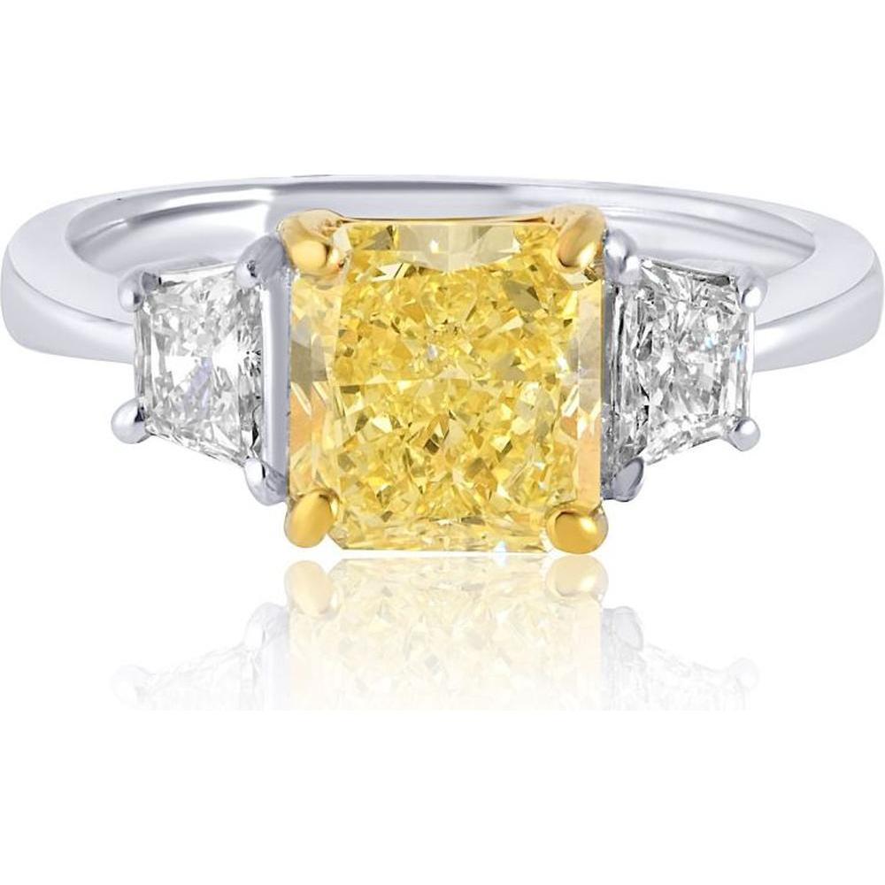 Close-up of a stunning diamond engagement ring with a halo setting on a velvet background