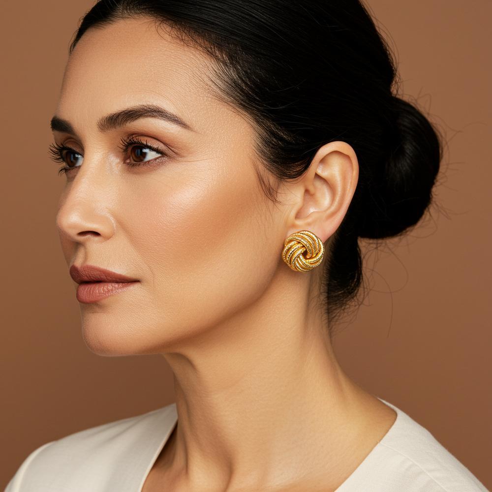 Close-up of intricate knot motif jewelry showing symbolic design details