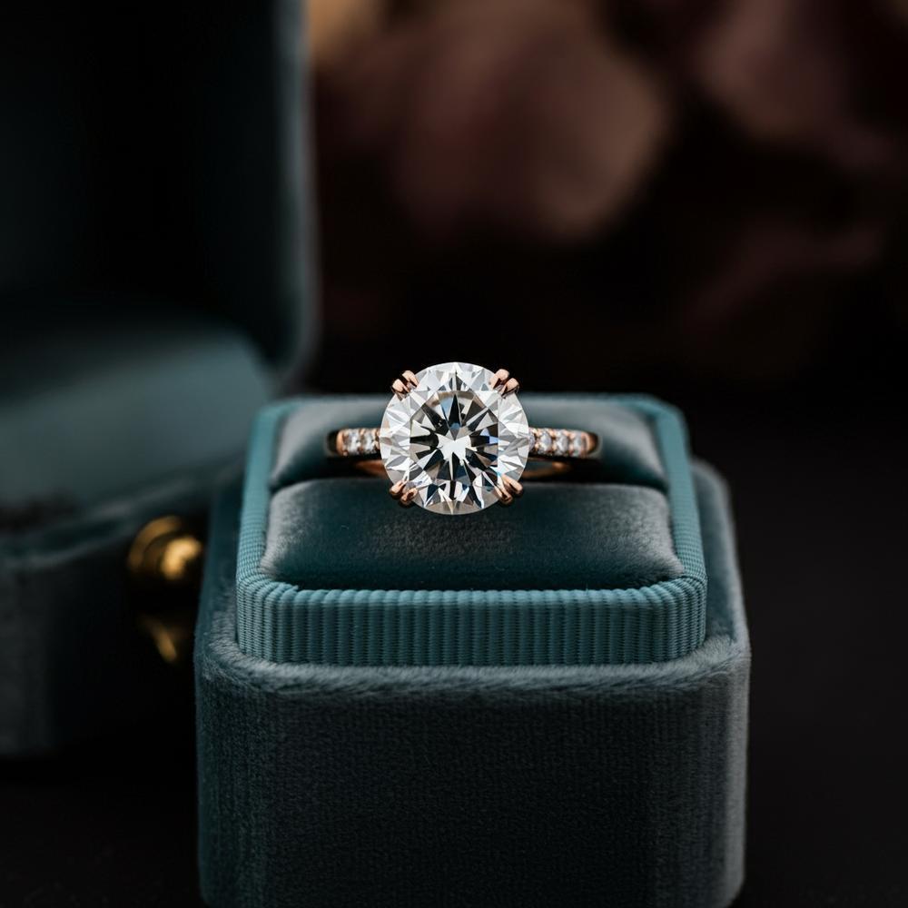 A selection of timeless diamond cuts including round brilliant, emerald, and princess cuts.