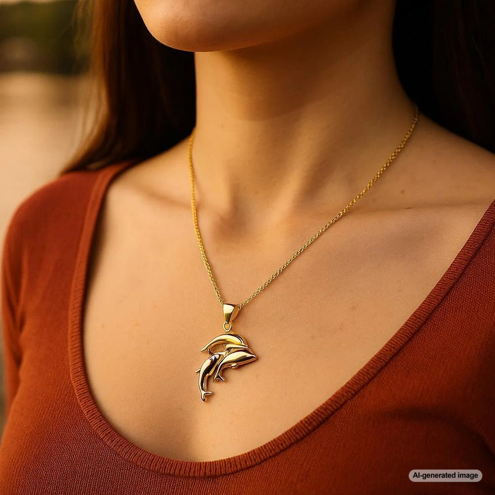 Luxury dolphin-themed bracelet and necklace set from Robinson's Jewelers
