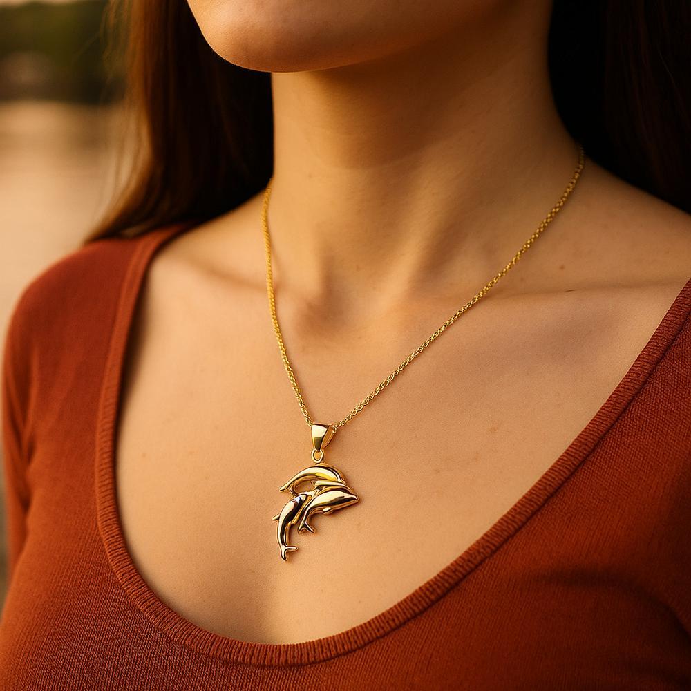 Luxury dolphin-themed bracelet and necklace set from Robinson's Jewelers