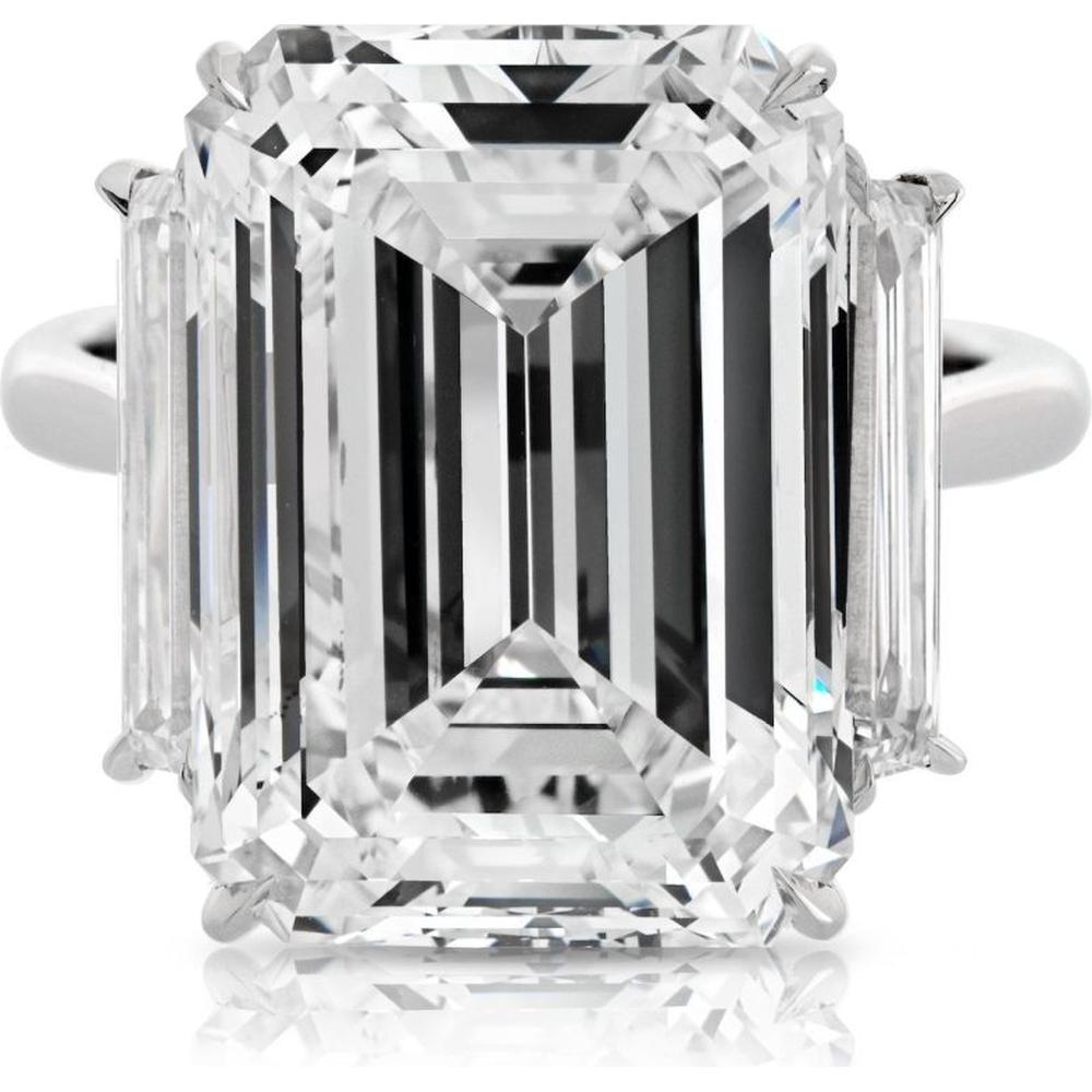 Close-up of a dazzling diamond ring sparkling under light