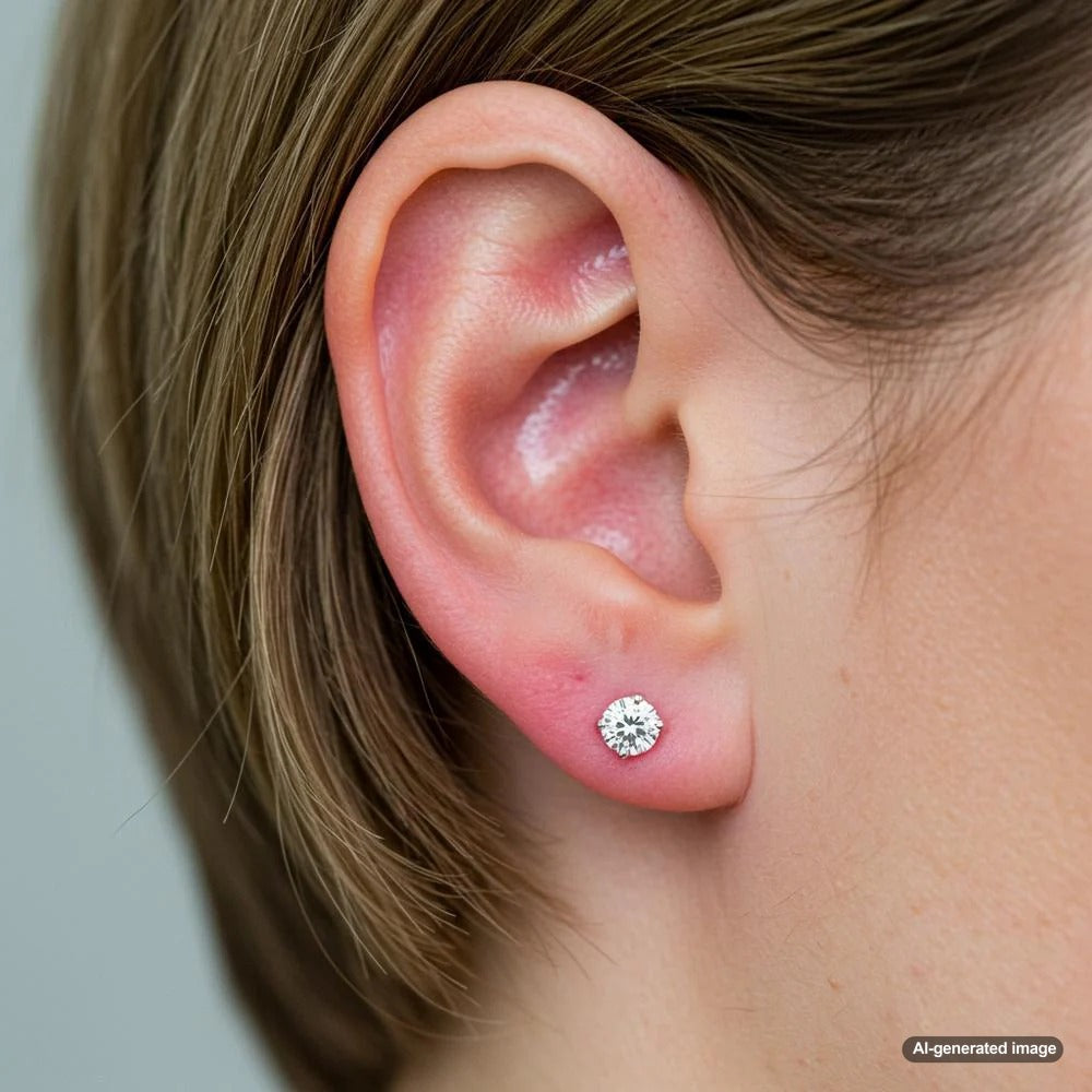 Woman touching her ear with irritation, showcasing earring sensitivity
