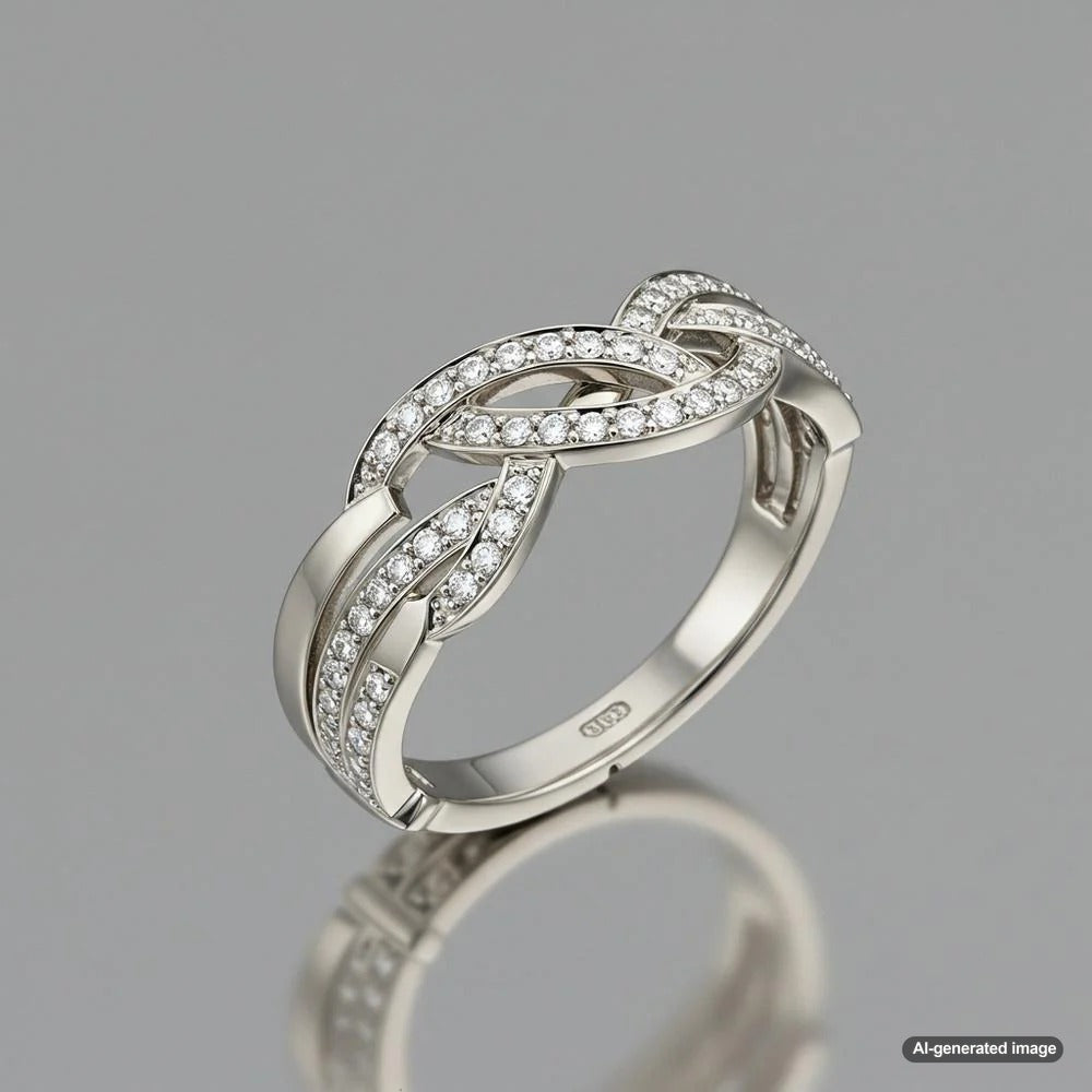 A beautiful collection of white gold jewelry, including rings, bracelets, and pendants, displayed elegantly.