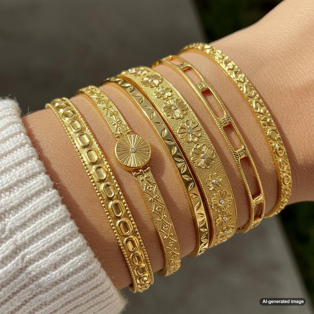 Elegant gold jewelry pieces showcasing necklaces, bracelets, and rings