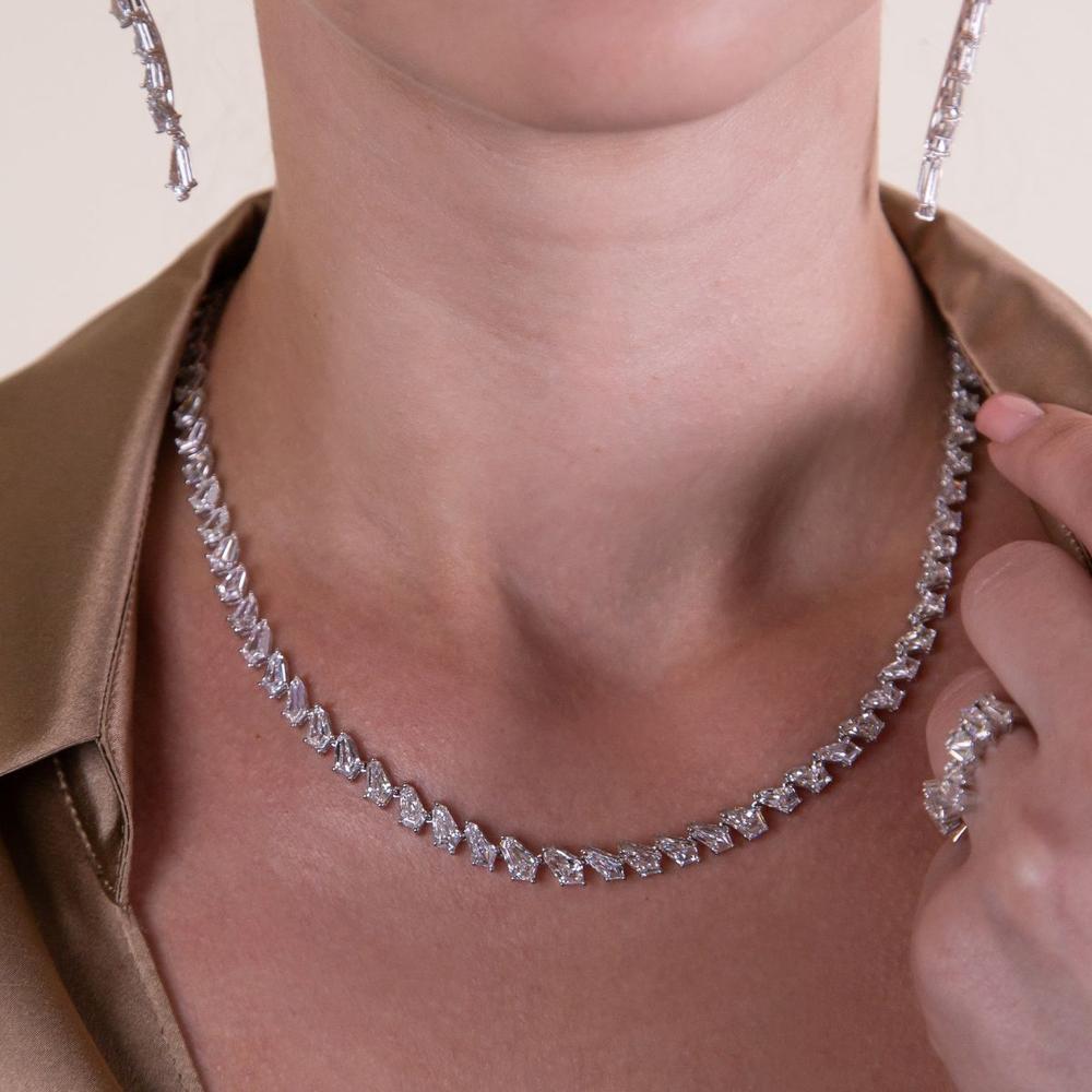 Elegant jewelry display featuring rings, necklaces, and bracelets at Robinson's Jewelers