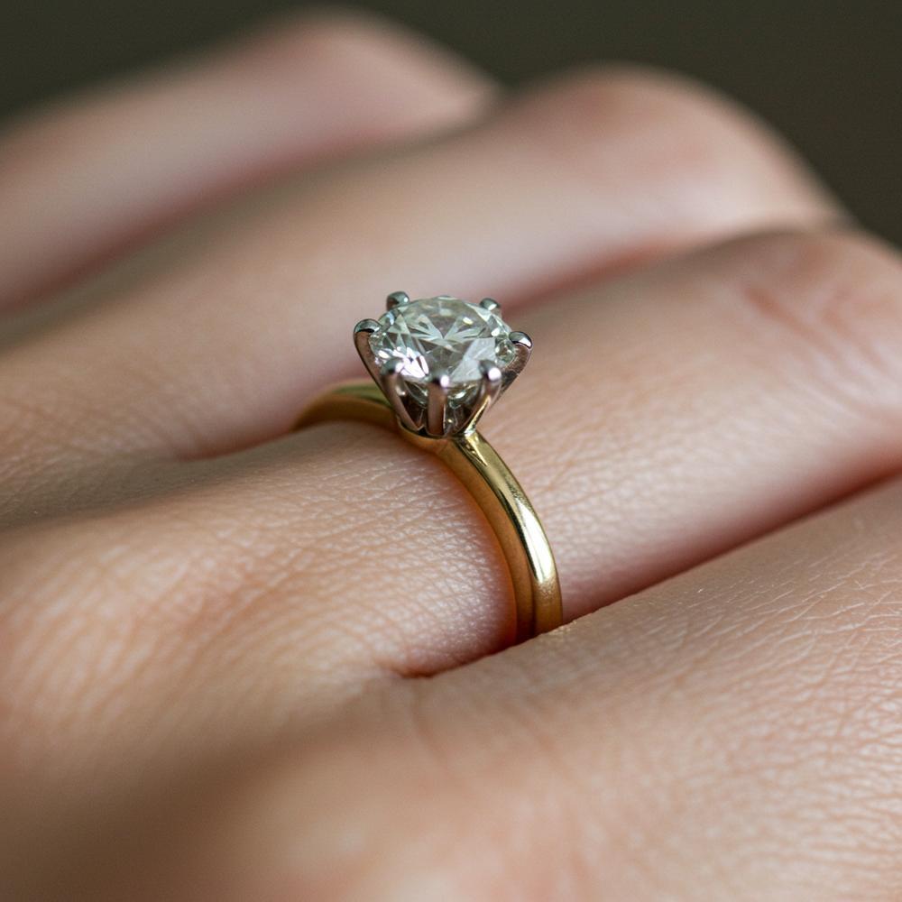 Close-up of a diamond ring showing proper cleaning techniques to restore shine