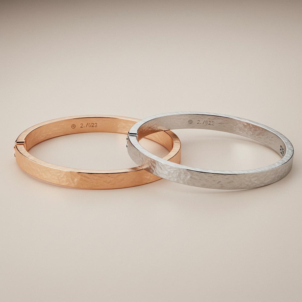 Rose gold and white gold jewelry comparison featuring rings and bracelets