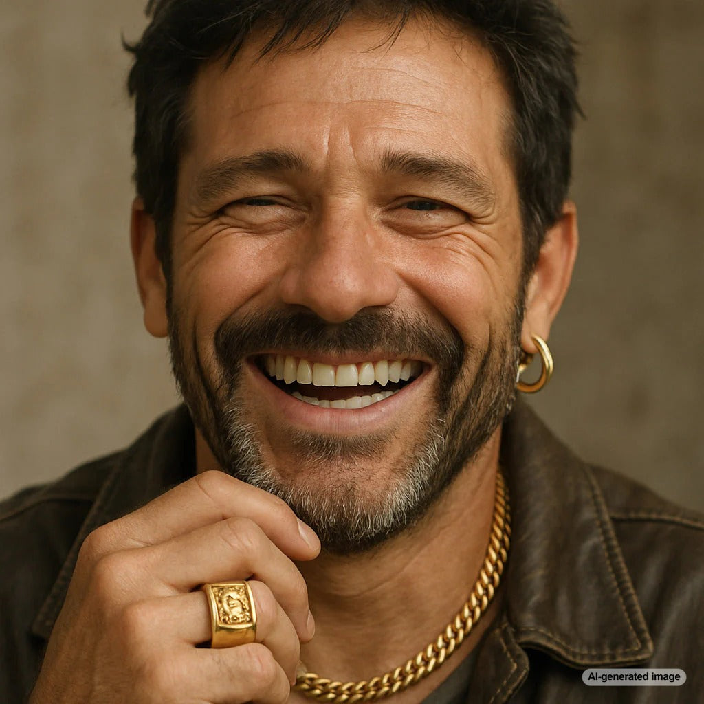Stylish men's jewelry collection featuring rings, chains, and bracelets from Robinson's Jewelers